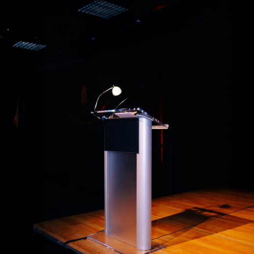 Podium with microphone on a presentation stage